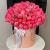Композиция в шляпной коробке из 113 пионов Корал Шарм в Куровском