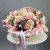 Композиция в корзине "Диодора" из французских роз Квиксенд, диантусов и кустовых пионовидных роз Бомбастик в Куровском